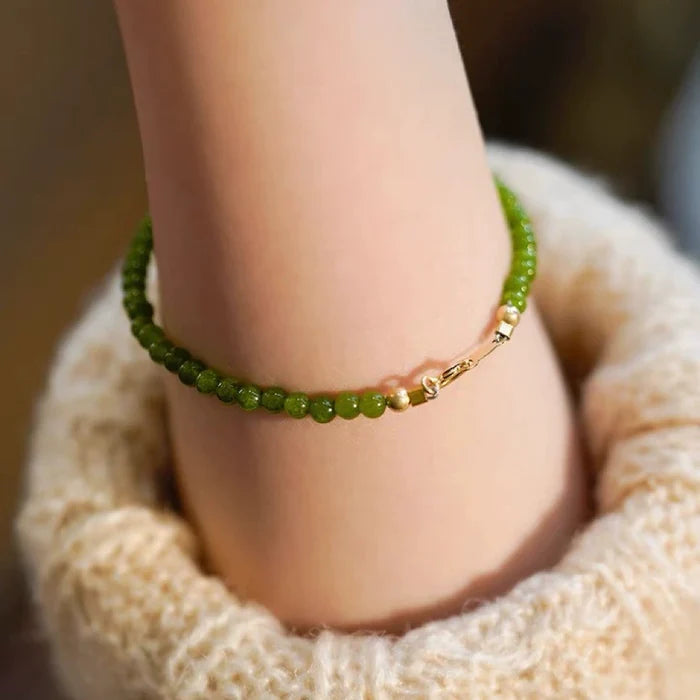 Elegant gold chain with green chalcedony beads