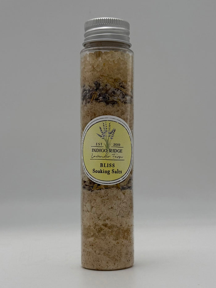 Bottle of Indigo Ridge Bliss Soaking Salts on a white background