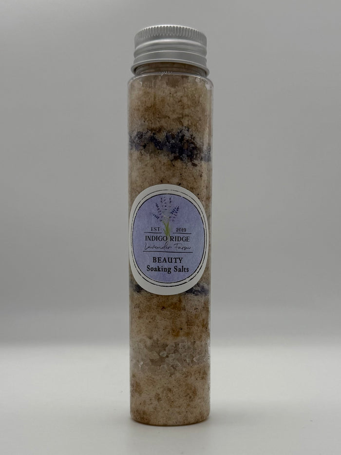 Tube of Indigo Ridge Beauty Soaking Salts with a label on a white background