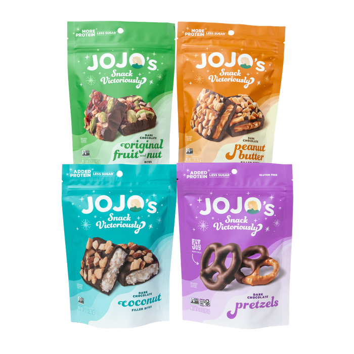 Best sellers dark chocolate bundle front of pack images. 4 flavors, pistachio almond cranberry, peanut butter, coconut almond and chocolate covered pretzels.
