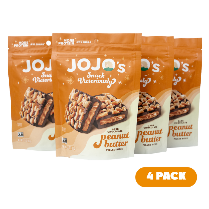 Four packages of JOJO's Dark Chocolate Peanut Butter Filled Bites on a white background