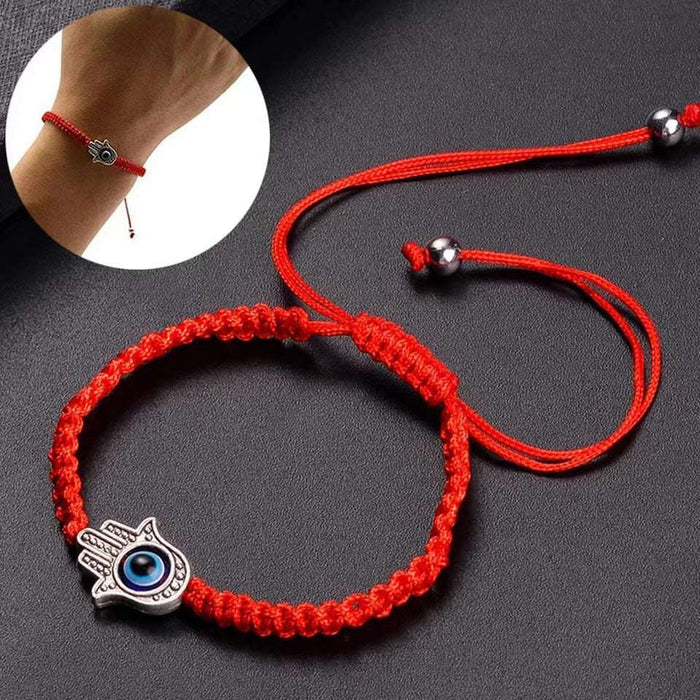 Hamsa hand red string protection charm bracelet close-up