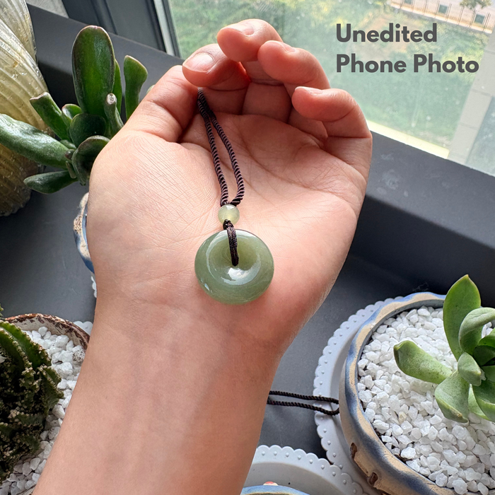 Hand polished Hetian jade pi disc pendant detail