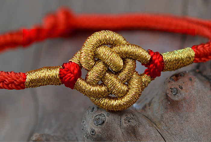 spiritual red thread bracelet money knot symbol