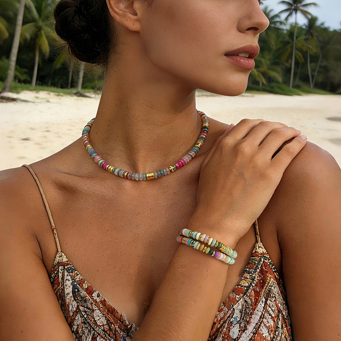 Woman wearing a natural 7 chakra gemstone bracelet