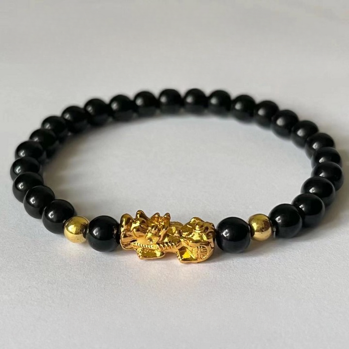 Gold Pixiu charm bracelet for wealth and prosperity energy