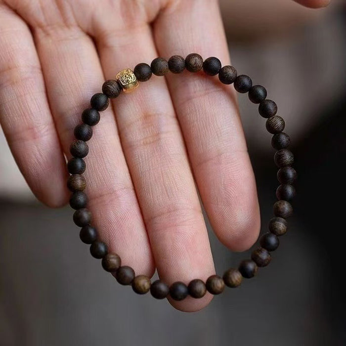 Handcrafted Natural Brunei Agarwood Bracelet with Gold Accent