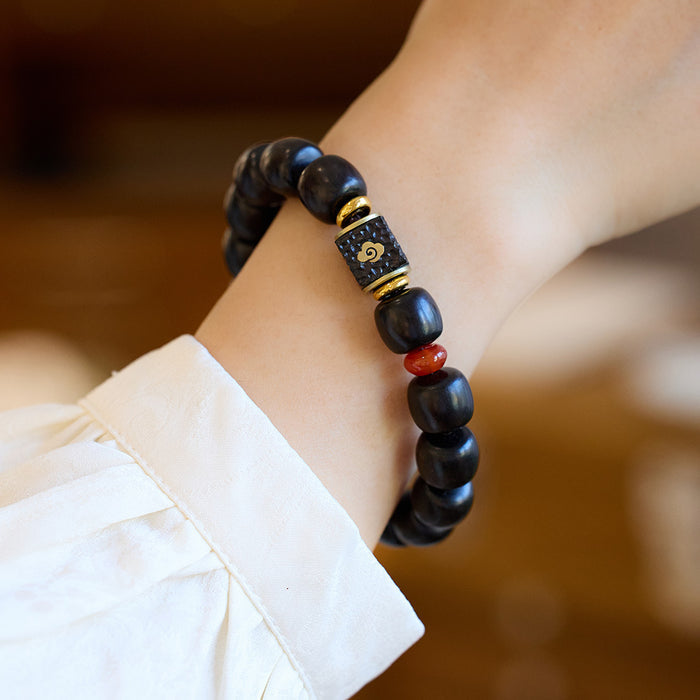 handmade black wood beaded bracelet with agate accents for meditation