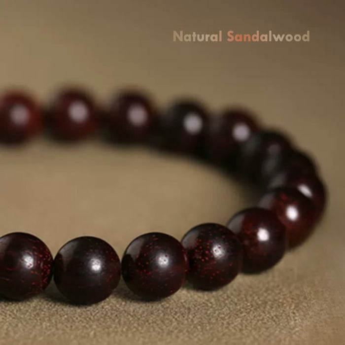 Close-Up of Hetian Jade Bead & Smooth Sandalwood Finish
