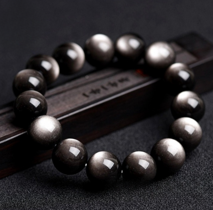 Close-up of genuine Silver Sheen Obsidian gemstone beads