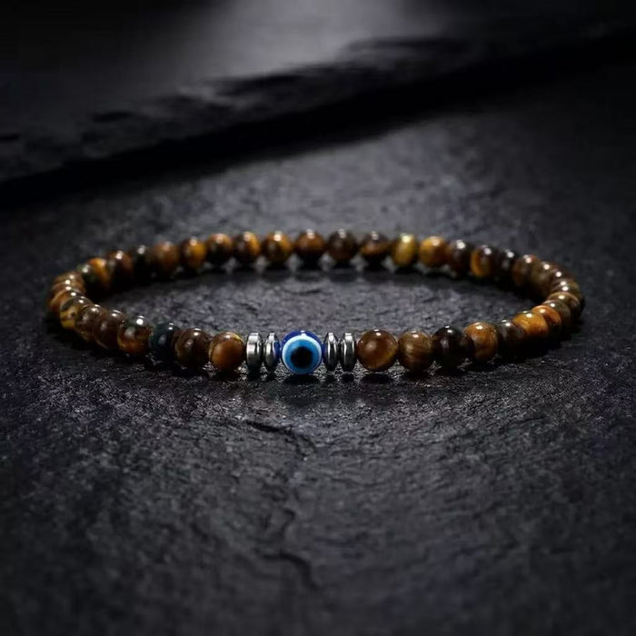Genuine Tiger Eye Evil Eye bracelet for men with hematite accents and 4 mm natural gemstone beads