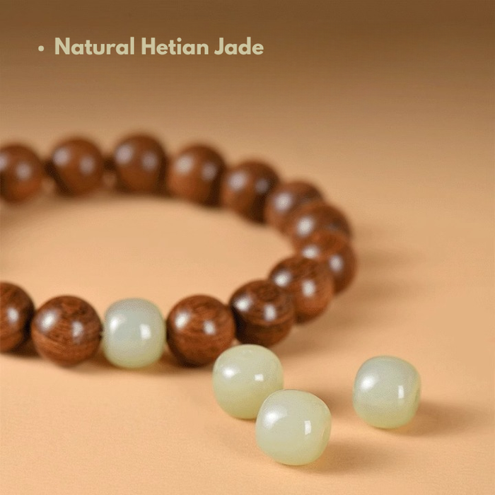 Close-up of genuine natural Hetian Jade bead on a wooden bracelet