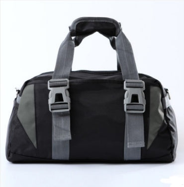 A pink and gray nylon yoga bag with a shoulder strap and a silhouette of a yoga pose on the front.