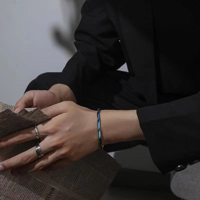 Men wearing rainbow stainless steel chain bracelet with modern casual style