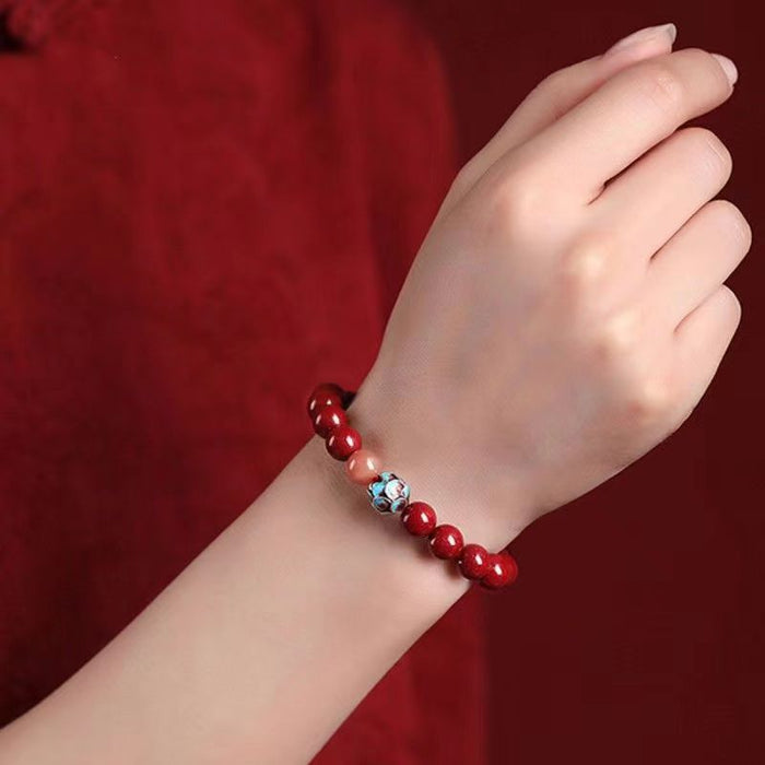 red cinnabar sunstone prosperity bracelet for women