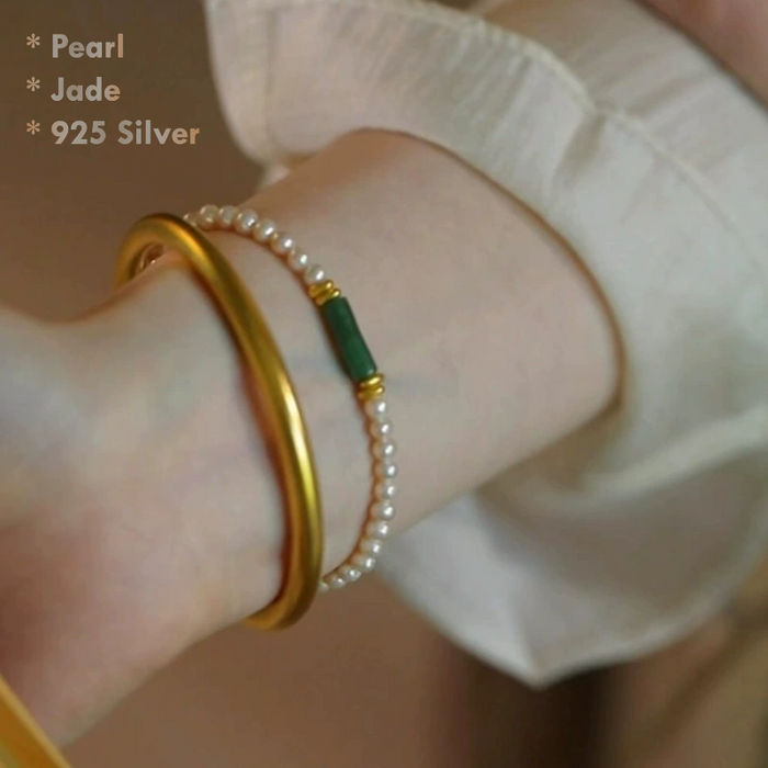 Real pearl bracelet shell pearls jade center 925 silver closeup