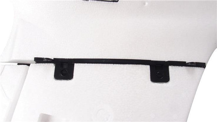 Black mounting bracket on white foam packaging for drone components