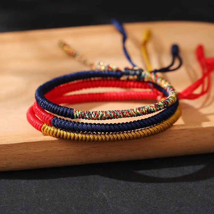 handmade red blue yellow rope bracelet for good fortune