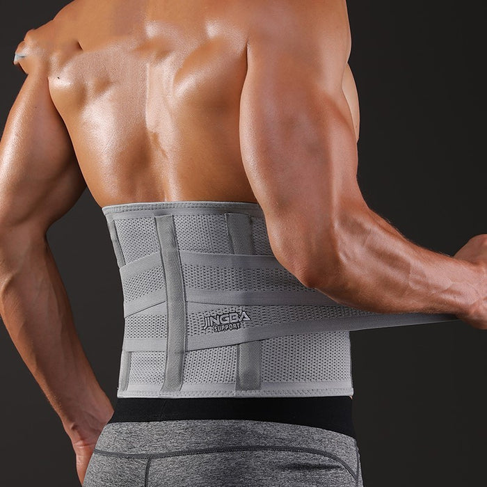 Person wearing a gray compression garment on their back.
